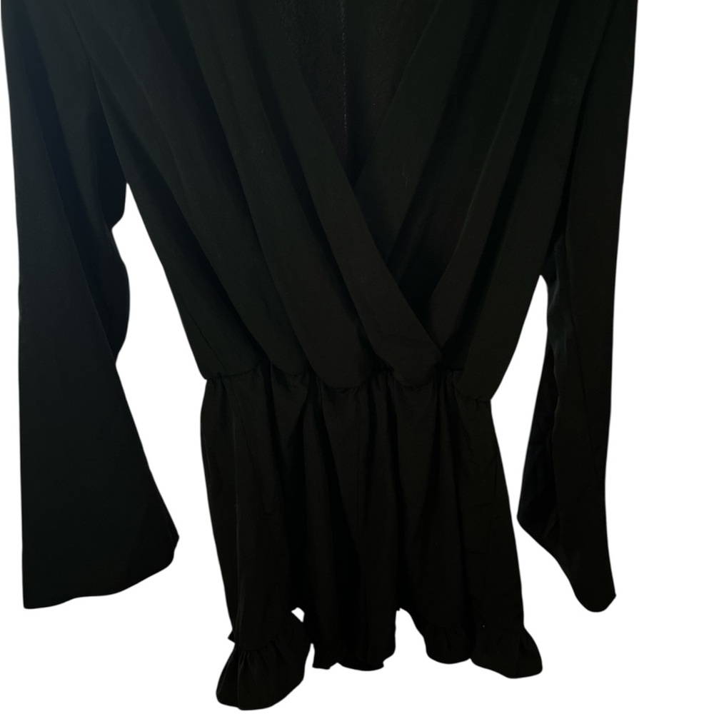 Elegant Black romper. PTP 20 L 49 I 2